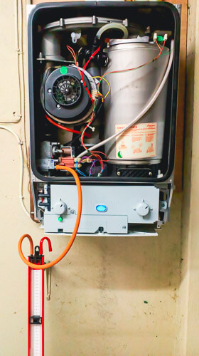 Inside a newly fitted central heating boiler.