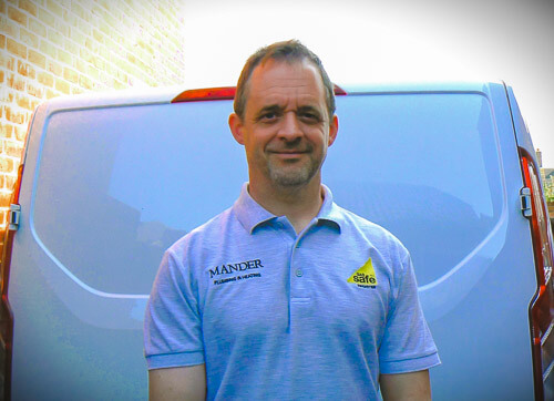 Simon Mander Plumber next to Van - Photo