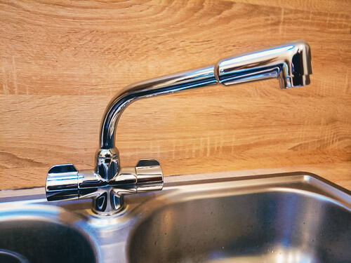 Kitchen tap and sink